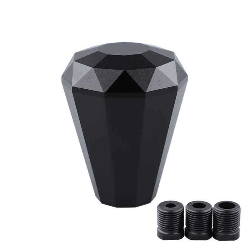 The universal gear shift knob is made of diamond shaped metal and is suitable for most car gear shift levers чёрный