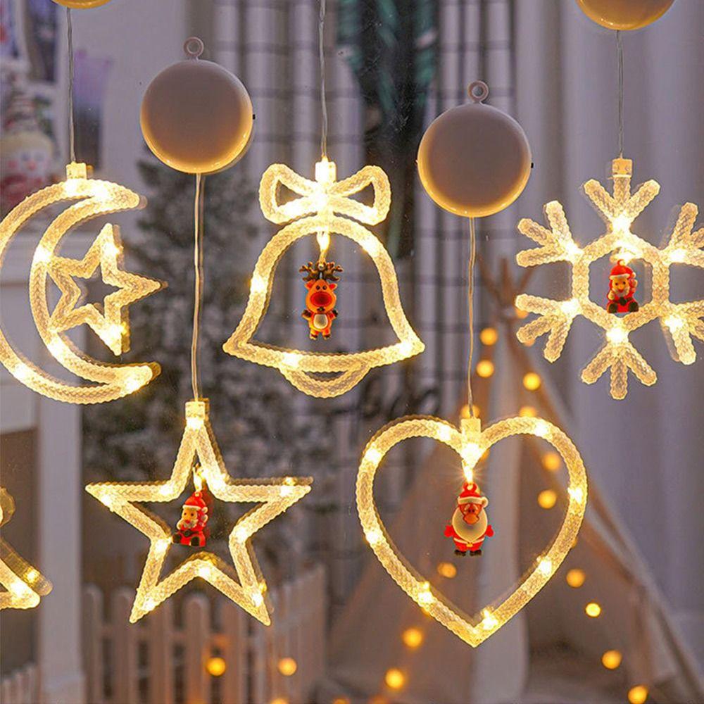 white-christmas-dining-room-with-garland-and-paper-stars