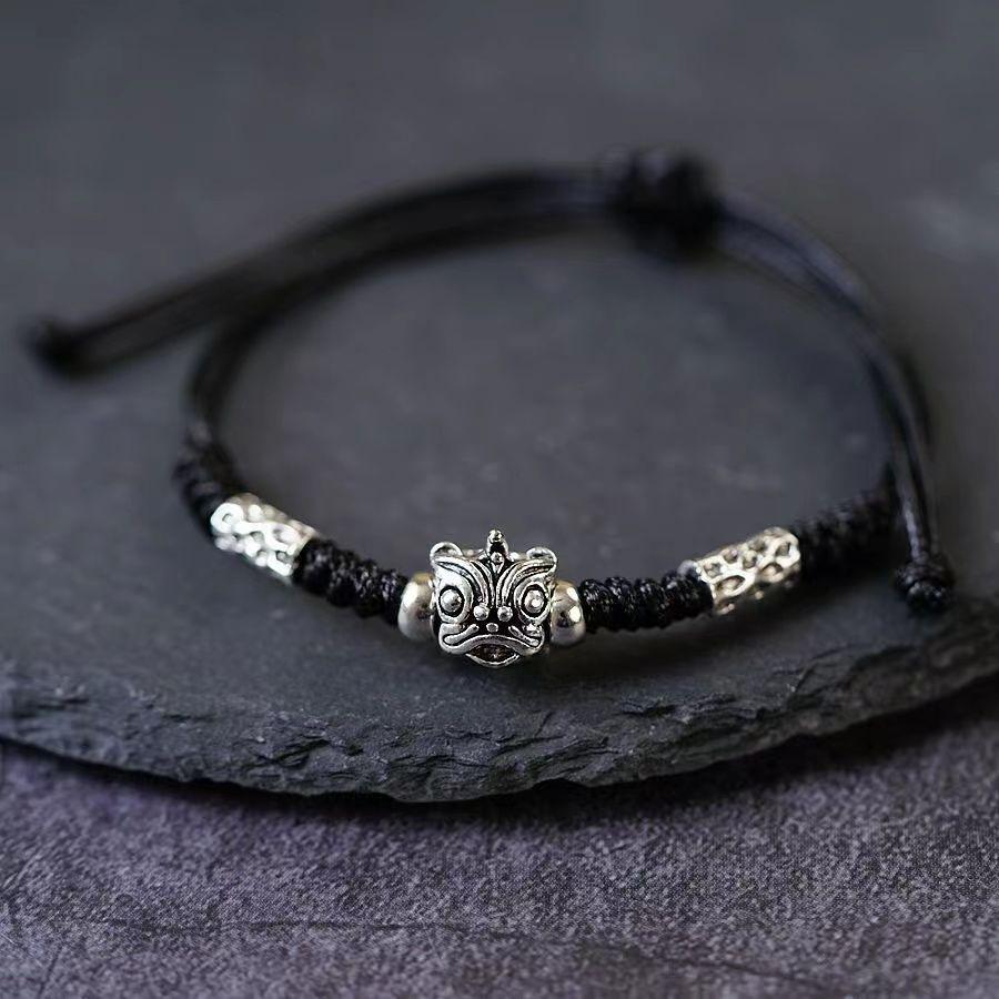 Charming Lion Dance Bracelet: Retro Unisex Adjustable Handwoven Lucky Charm.