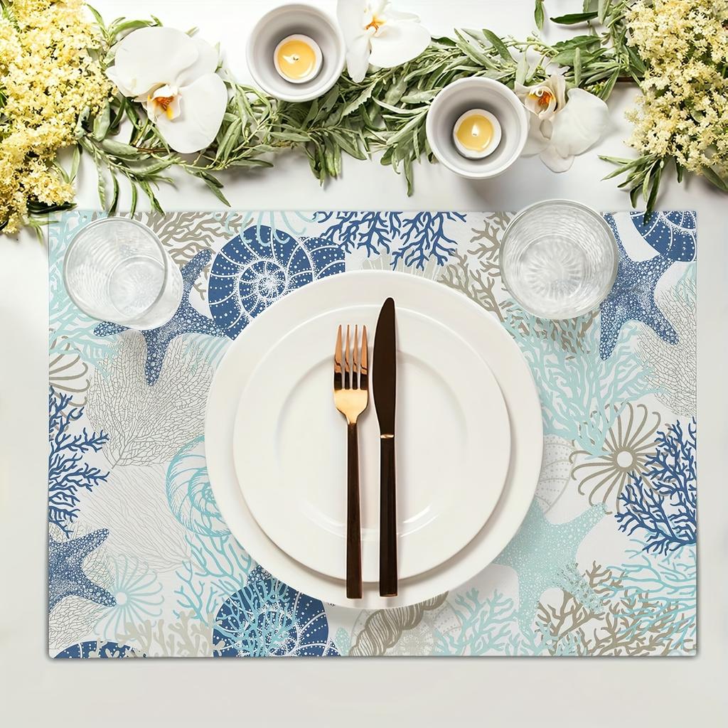 Set of 4 Summer-Themed Placemats Featuring Ocean Designs, Including Starfish And Seashells. These Washable, Non-Slip, And Heat-R