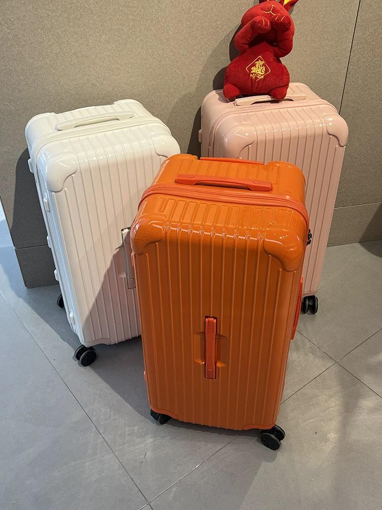 Thickened 24" PC Trolley Case: Drop-resistant, Large Capacity Suitcase with Combination Lock, Available in 26" & 30" Sizes, Leather Accent for Women.