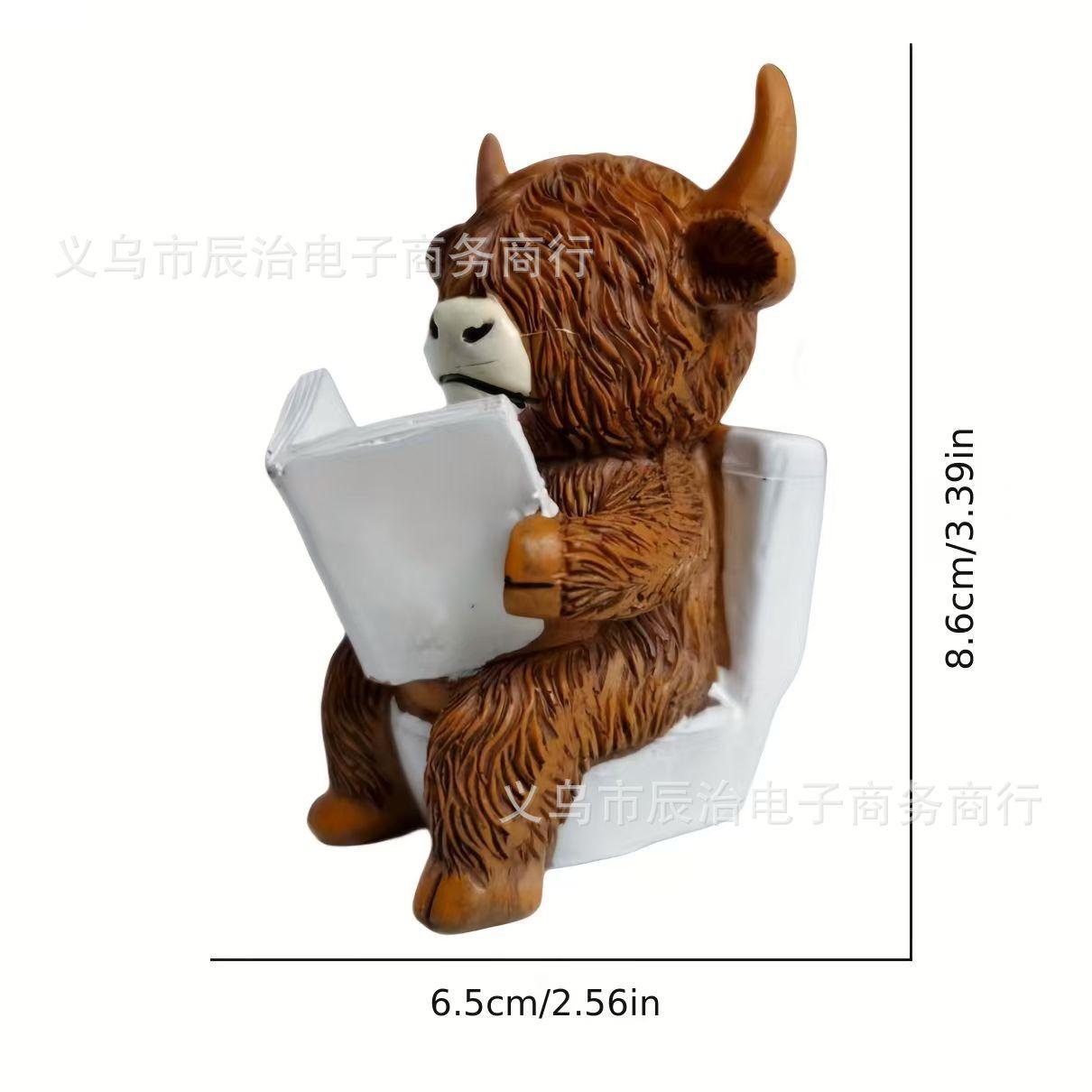 

New Creative Home Desktop Resin Bathroom Sitting Toilet Heights Cow Statue Ornament Holiday Ornaments