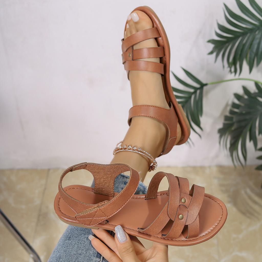 Flat-soled sandals women's summer casual rivet sandals comfortable flat-soled fashion versatile Roman beach