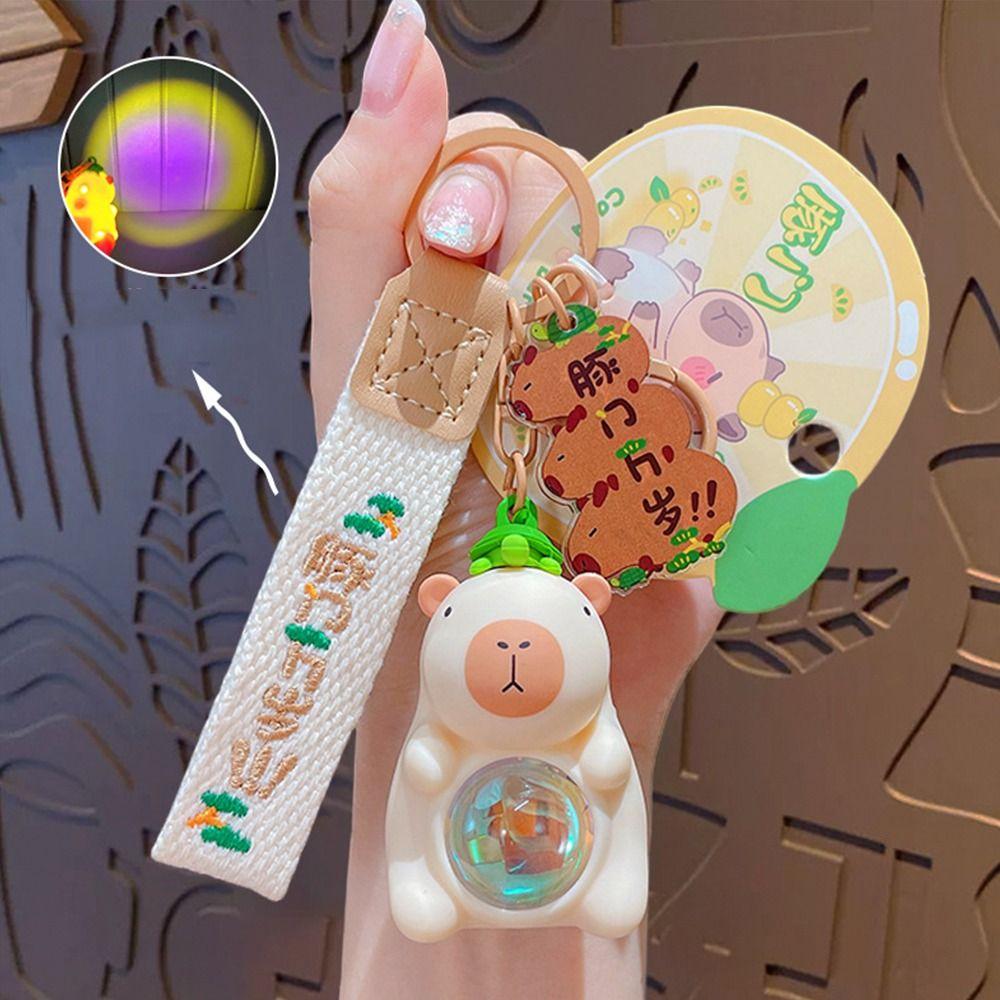 

Glowing Capybara Light Keychain Cartoon Flashing Light Keyring Capybara Doll Keyring Y2K Gifts бежевый