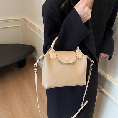 Damhandväska mångsidig dumpling: 2025 Vår/Sommar Casual Enkel Axel & Crossbody Stil