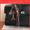 Llavero de Cuero Vintage Espina de Pescado Encanto Creativo para Bolso para un Accesorio de Estilo Único