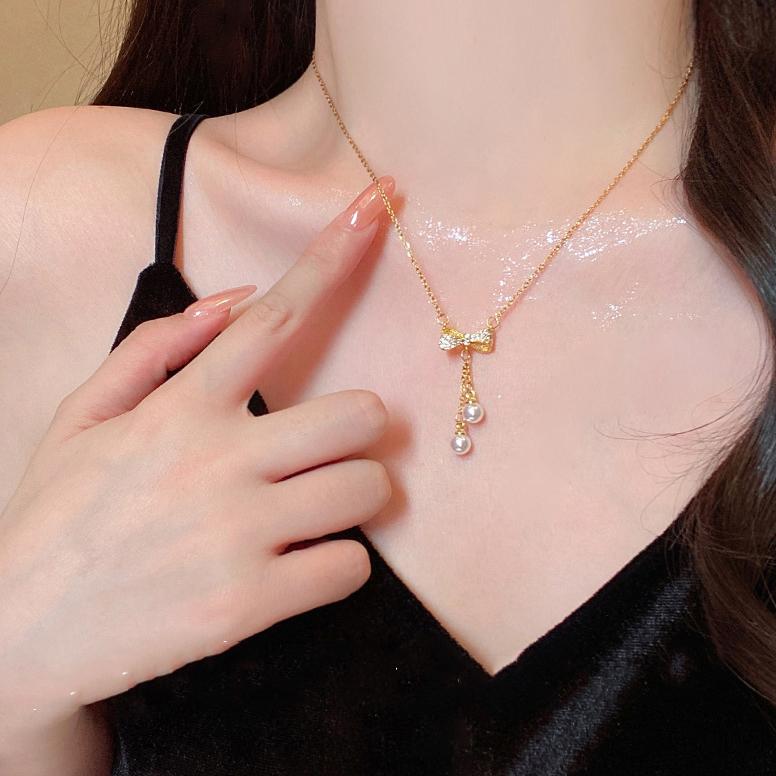 

2026 New Imitation Pearl Bow Tassel Necklaces for Women Girls Fresh Sweet Light Luxury Rhinestone Necklaces Jewelry Accessories