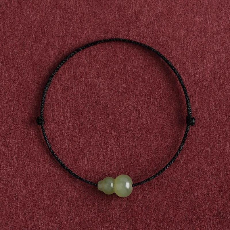 

Браслет из натурального нефрита Хэтянь в форме тыквы, плетеный красным шнурком, для мужчин и женщин, на год рождения, приносящий удачу и богатство. Hetian Jade gourd thin black rope anklet (adult)