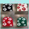 Trendy Acrylic Knit Cap For Women With Floral Design And Ear Protection In Winter