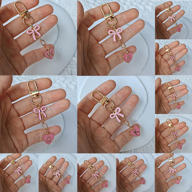 Creative Letters Metal Pink Bow Keychain Fashion A-Z 26 Letters Keyring Charms Mobile Phone Key Holders Bag Accessories Gift