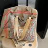 Large capacity single shoulder handbag for women, ins canvas bag, niche class commuting high-value floral tote bag.zwq