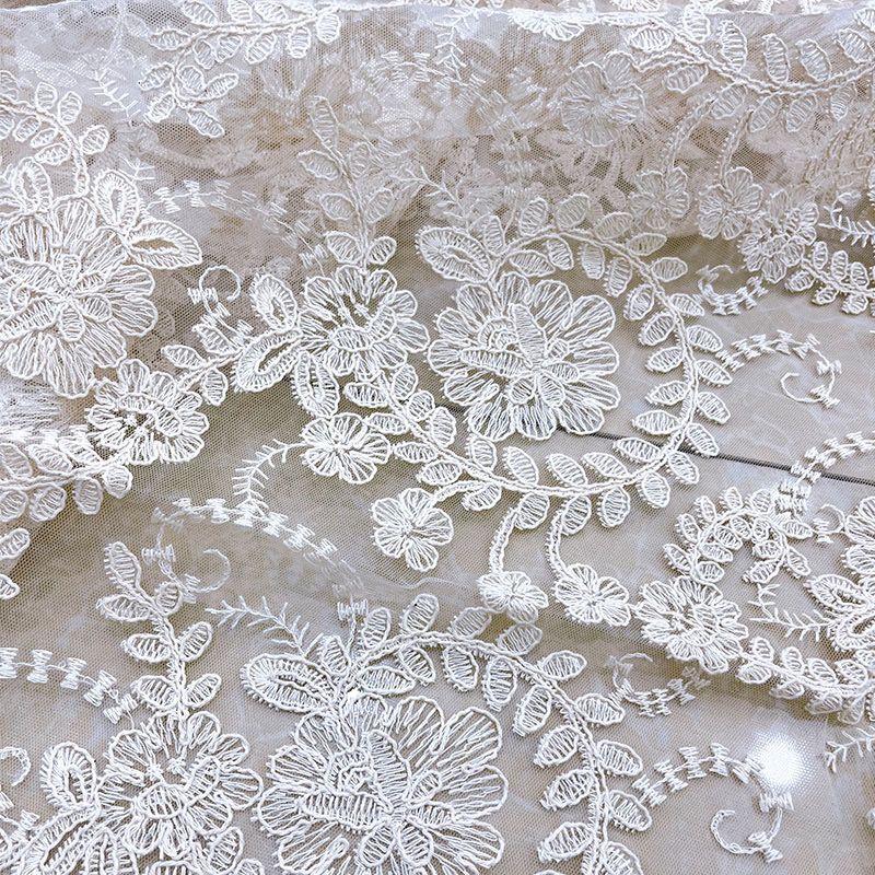 Embroidered Lace Fabric with Flower-like Patterns Suitable for Wedding Dresses Formal Gowns and Designer Clothing Fabrics