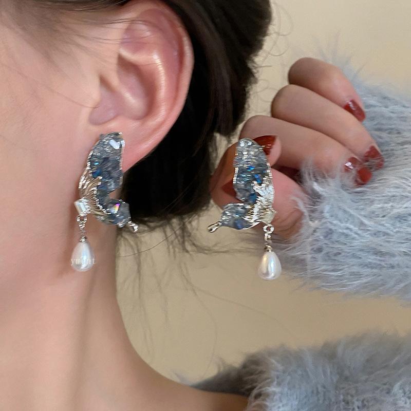 

Super fairy butterfly wings pearl stud earrings female tide autumn and winter niche design senior earrings light luxury temperament ear jewelry