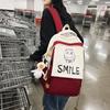 Schoolbag new student backpack casual large-capacity computer bag Korean version cute smiley face couple schoolbag manufacturer wholesale