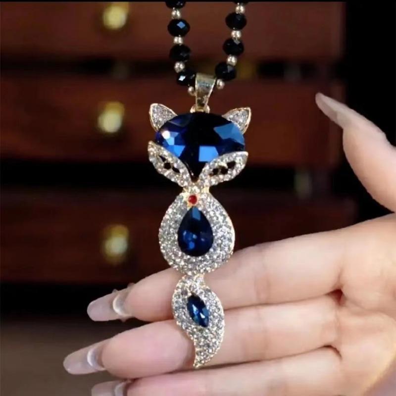 

Inlaid zircon long sweater chain for women, temperament versatile clothes accessories pendant