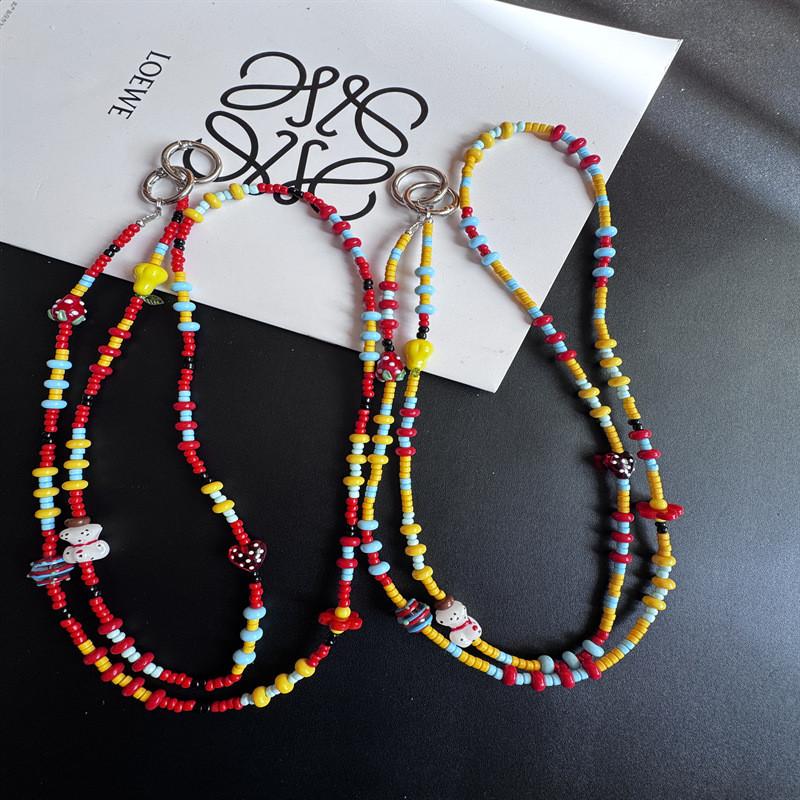 Pvc Colorful Dot Dog Phone Strap With Handcrafted Design For Women And Men