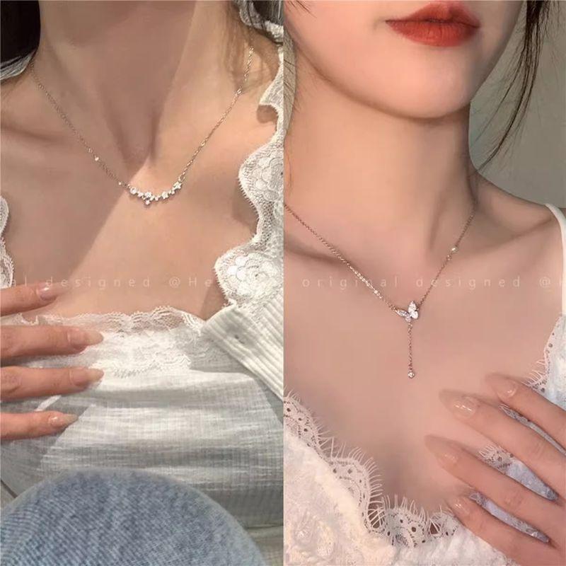 

Exquisite Necklace for Women 2025 New Arrival Fancy Light Luxury Minority Student Party Ornament XINGX Butterfly Clavicle Chain Zircon star + Pearl butterfly necklace 2 Pack]