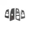BMW 5 Series Carbon Fiber Interior Trim: Center Console, Gear Shift, Multimedia Panel, Air Vents.