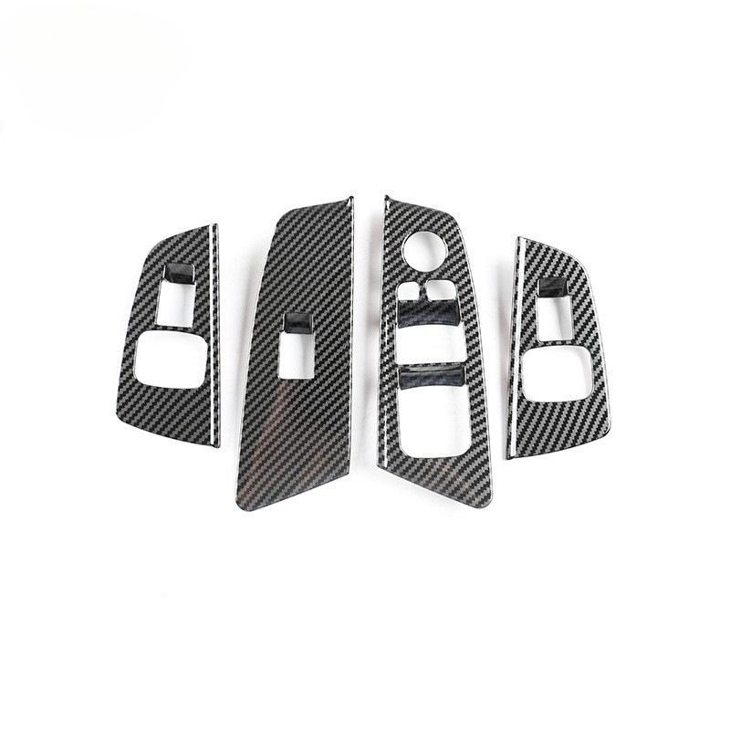 BMW 5 Series Carbon Fiber Interior Trim: Center Console, Gear Shift, Multimedia Panel, Air Vents.