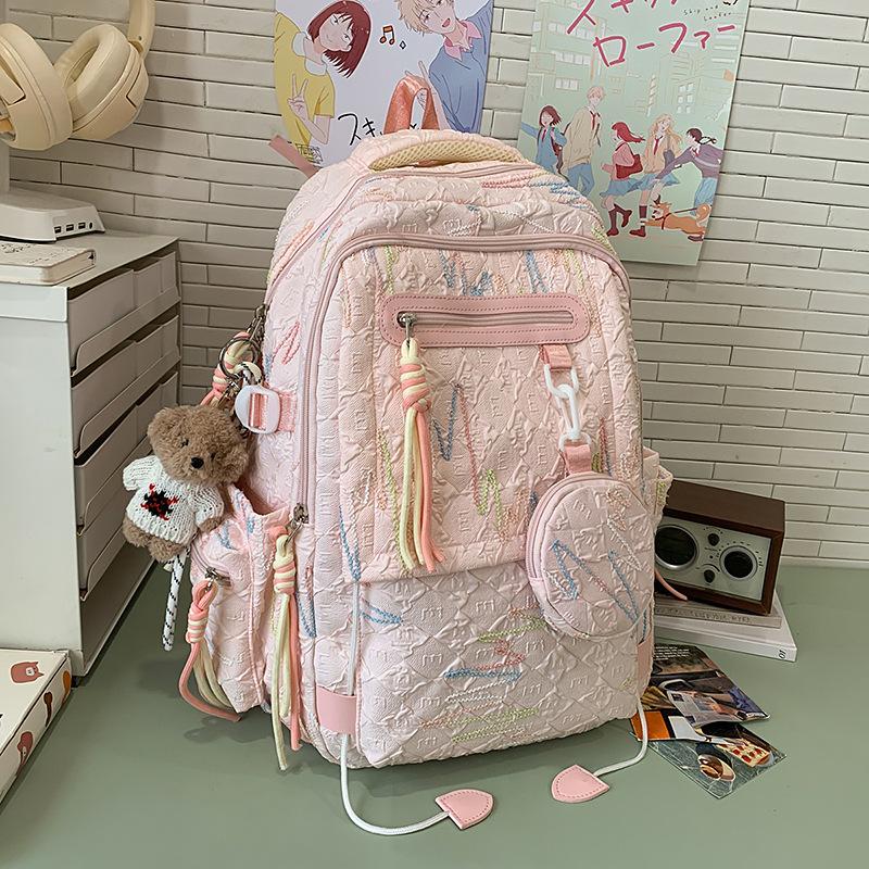 Trendy high-value schoolbag girls, primary school students, junior high and high school students, niche design, simple and versatile backpack women