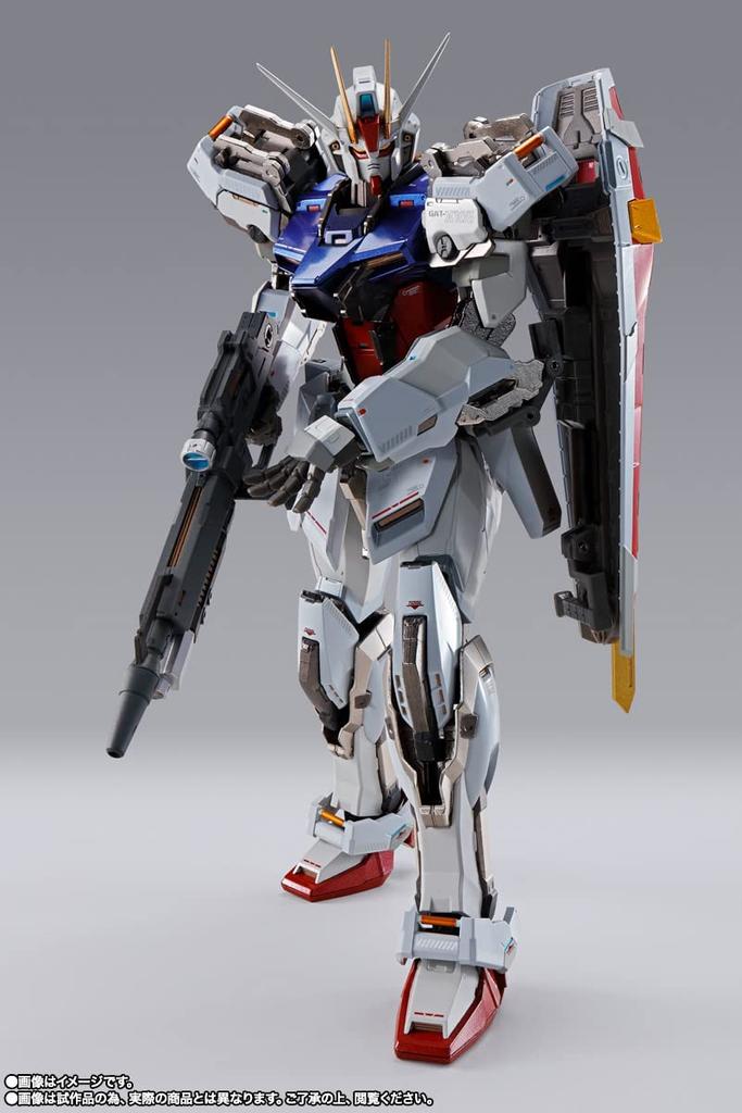 KOVOVÁ STAVBA „Mobile Suit Gundam SEED“ Strike Gundam - Heliopolis Rollout Verze. - Cca. 180mm ABS, PVC a tlakově litá pohyblivá figurka