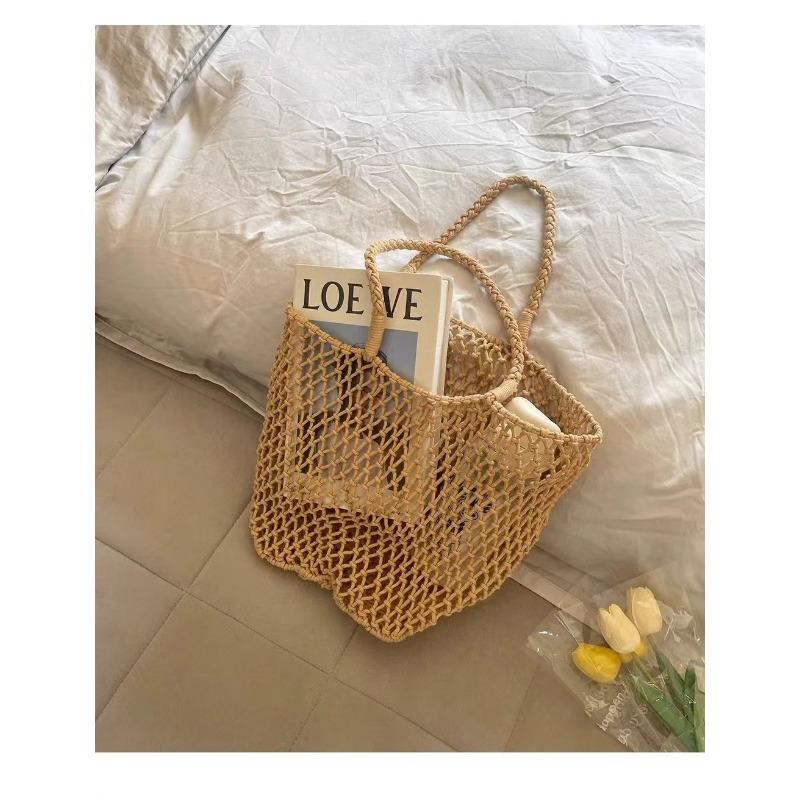 Sac de plage tissé creux design de niche d'été pour femmes nouveau sac à bandoulière en maille grande capacité