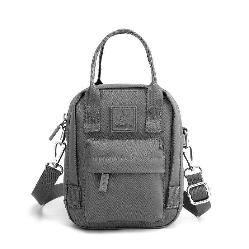 A women's fashion trend messenger bag with simple personality Mobile phone bag Anti-splashing nylon messenger bag