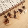 Chinese Floral Tassel Pendant Necklace - Ethnic Niche Design for Women, Versatile Long Sweater Chain Fashion Accessory