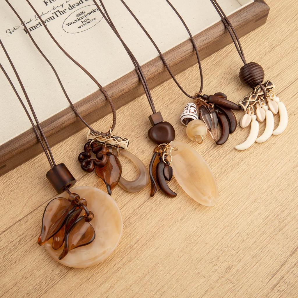 Chinese Floral Tassel Pendant Necklace - Ethnic Niche Design for Women, Versatile Long Sweater Chain Fashion Accessory