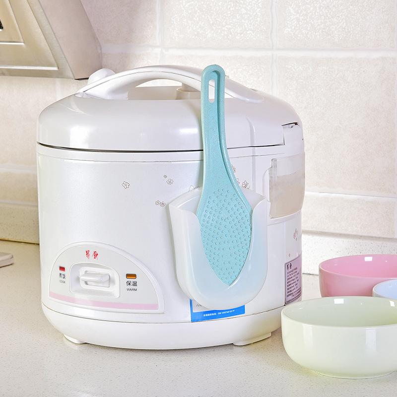 Suction cup type rice spoon holder kitchen plastic spoon rack rice scoop wall hanging shovel rack