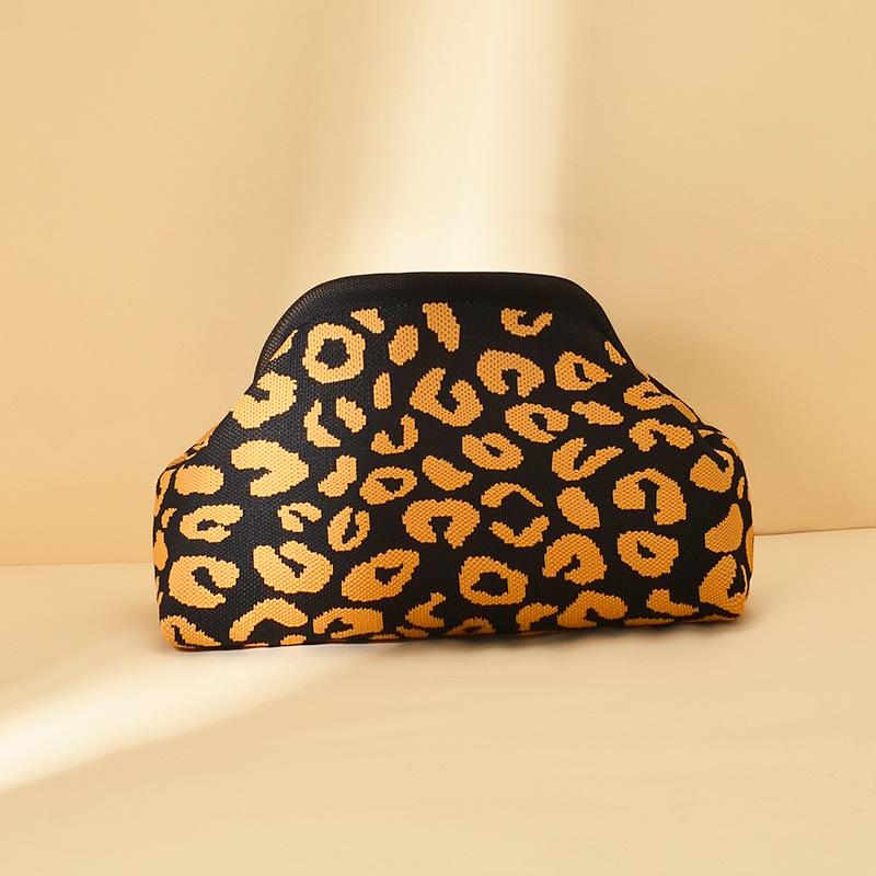Knitted bag, striped clutch bag, women's flying woven clouds, versatile temperament, portable cosmetic bag, large capacity