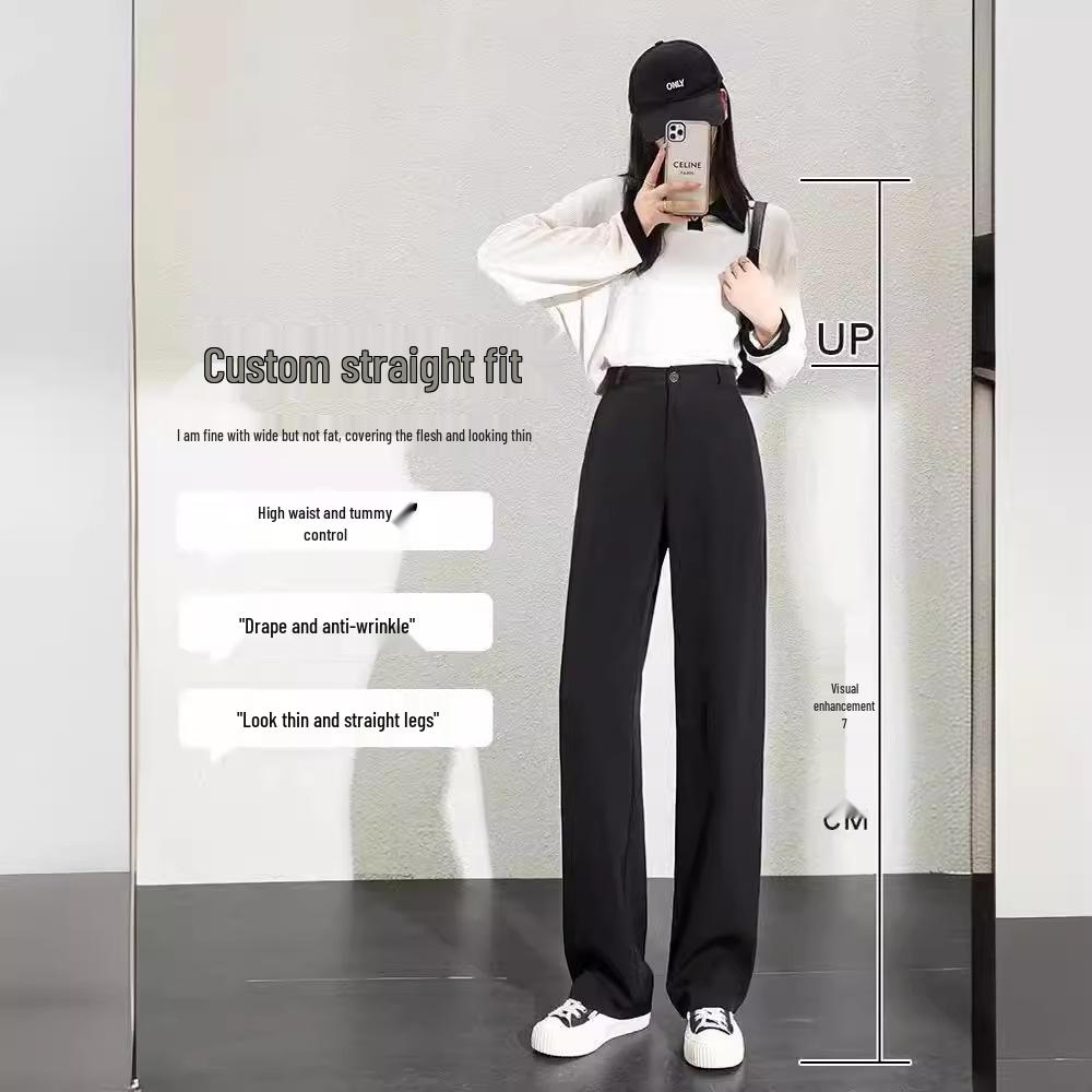 Spodnie damskie garniturowe w kolorze czarnym z wysokim stanem i szerokimi nogawkami na wiosnę i jesień 2023.