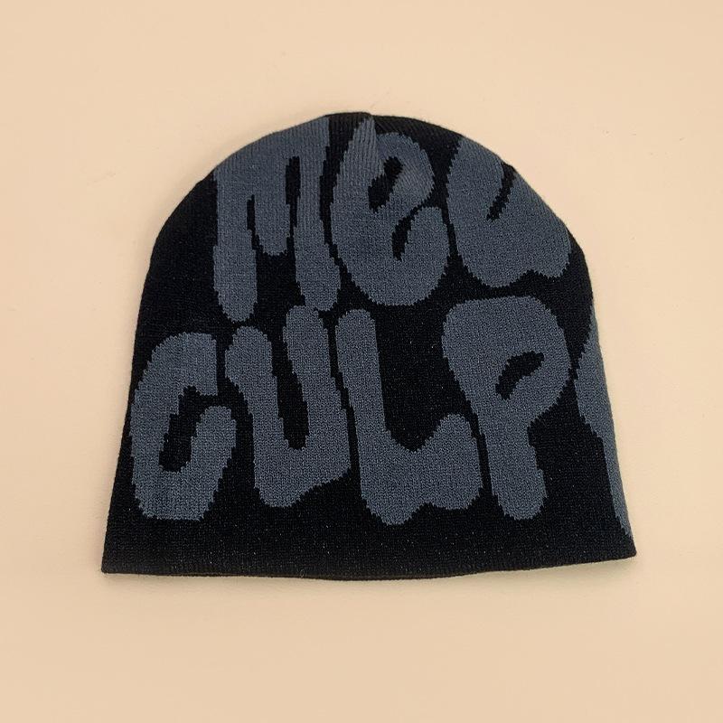 New European and American popular alphabet flame spider skull knitted hat men and women autumn and winter personality hip hop warm