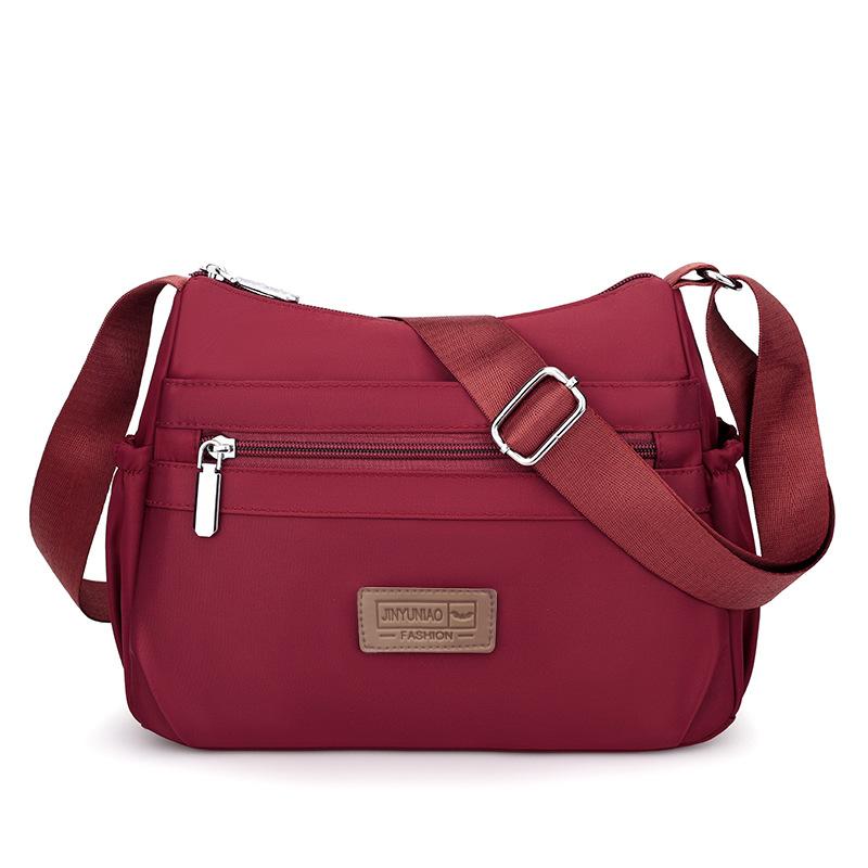 

2025 new simple and versatile messenger bag large capacity lightweight mother bag solid color