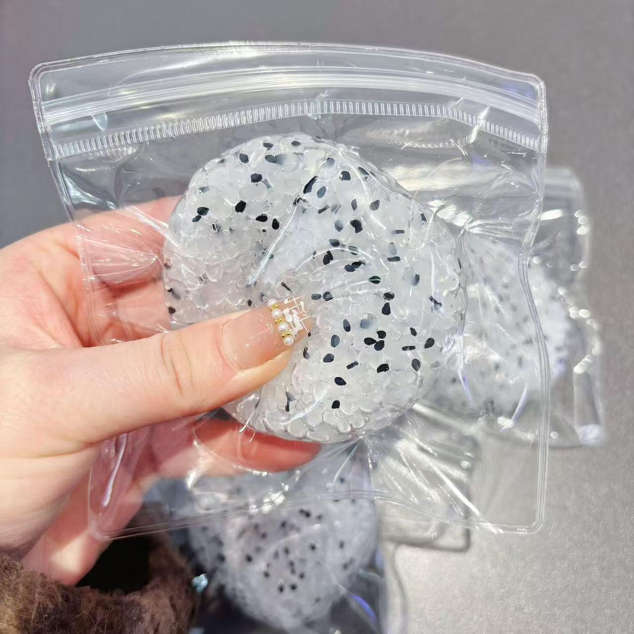 

Douyin Sesame Rice Ball: Handmade Voice-Controlled Decompression Toy, Slow Rebound Plastic Rice Grain