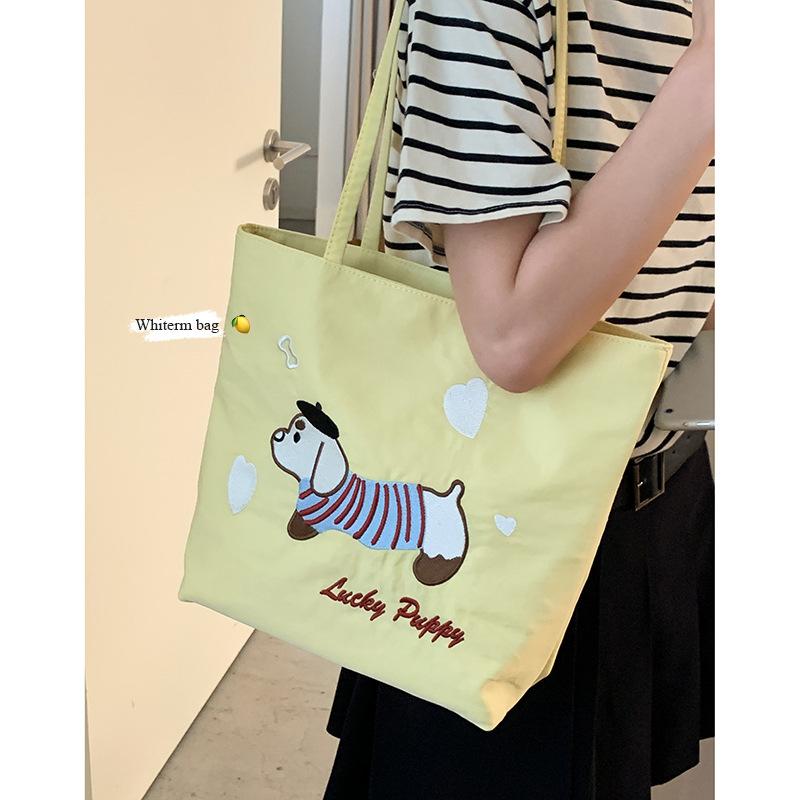 Canvas Bag Design Sense Niche Underarm Bag Women 2025 New Simple Cartoon Puppy Tote Bag Shoulder Bag Portable