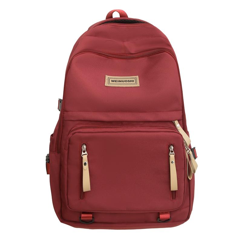 

Чоловічий однотонний рюкзак великої місткості. Шкільний рюкзак старшокласника. Дорожній рюкзак. Жіноча сумка для комп’ютера. червоний