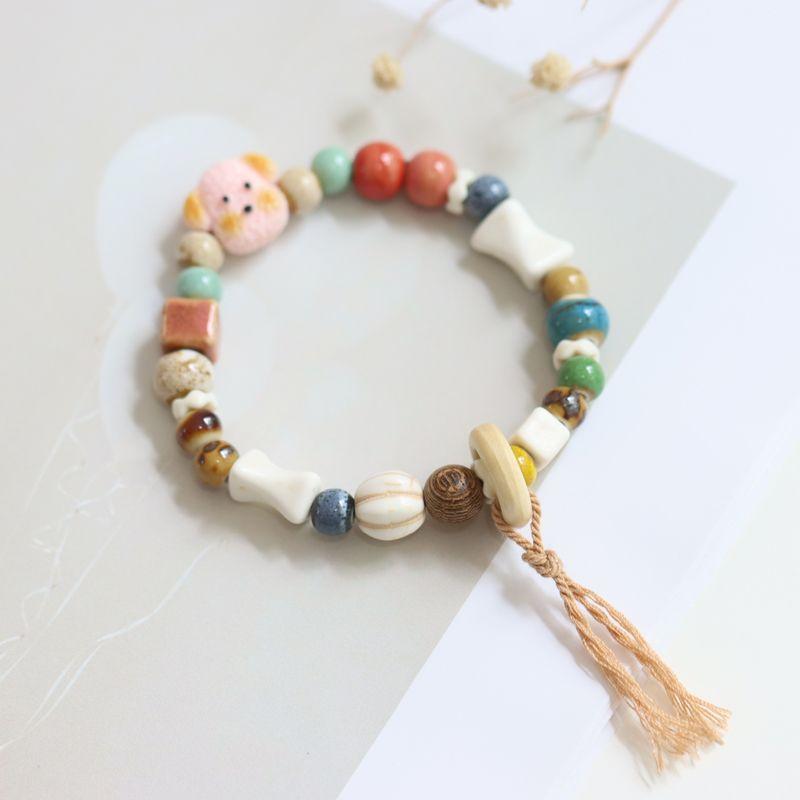 

Милый щенок Тедди мультяшный маленькое животное Цзиндэчжэнь керамический браслет подругам фарфоровые бусины-розочки нишевый стиль женский браслет украшение 59 Pink