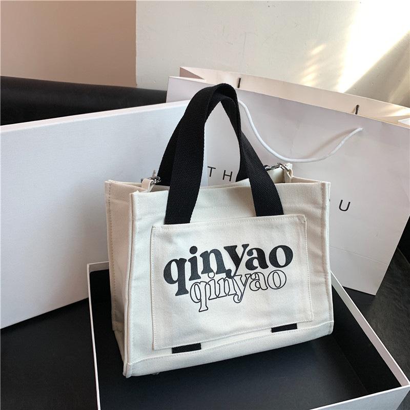 Tote bag niche new portable shoulder bag lazy women large capacity lightweight new versatile casual canvas backpack
