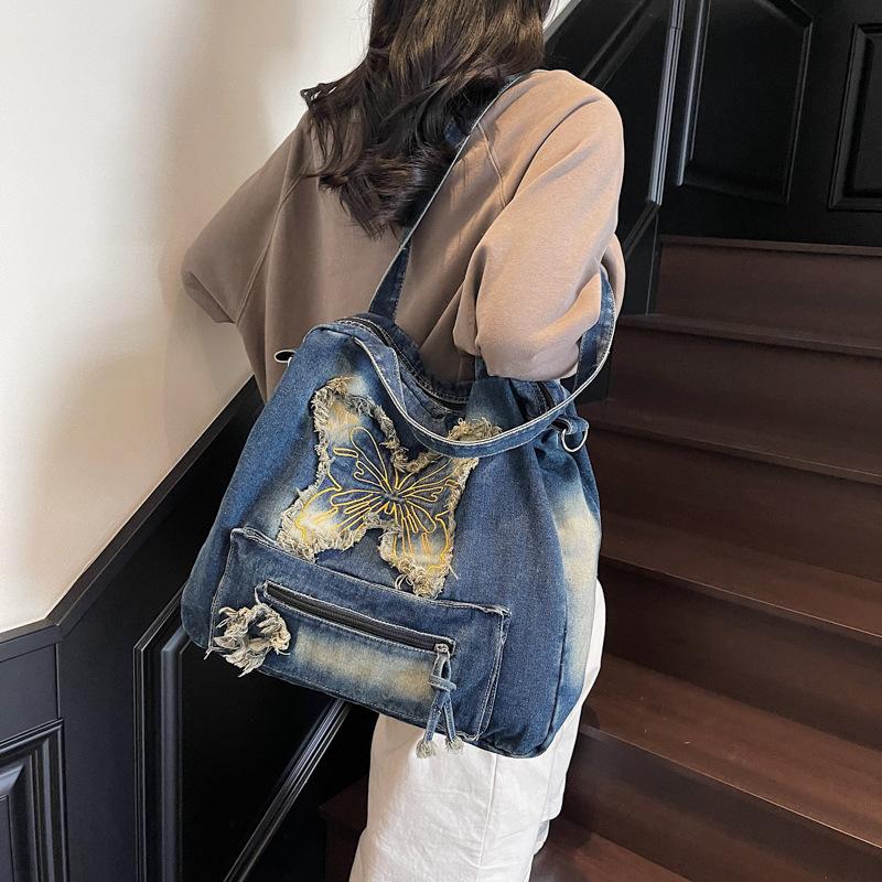New fashionable large-capacity contrasting color washed denim versatile casual ins wind shoulder portable student commuting bag