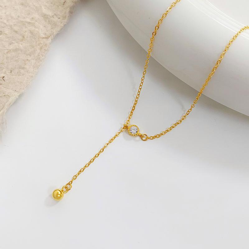 

Круглое женское ожерелье с кисточками и бусинами в холодном и роскошном стиле. Цепочка на ключицу.