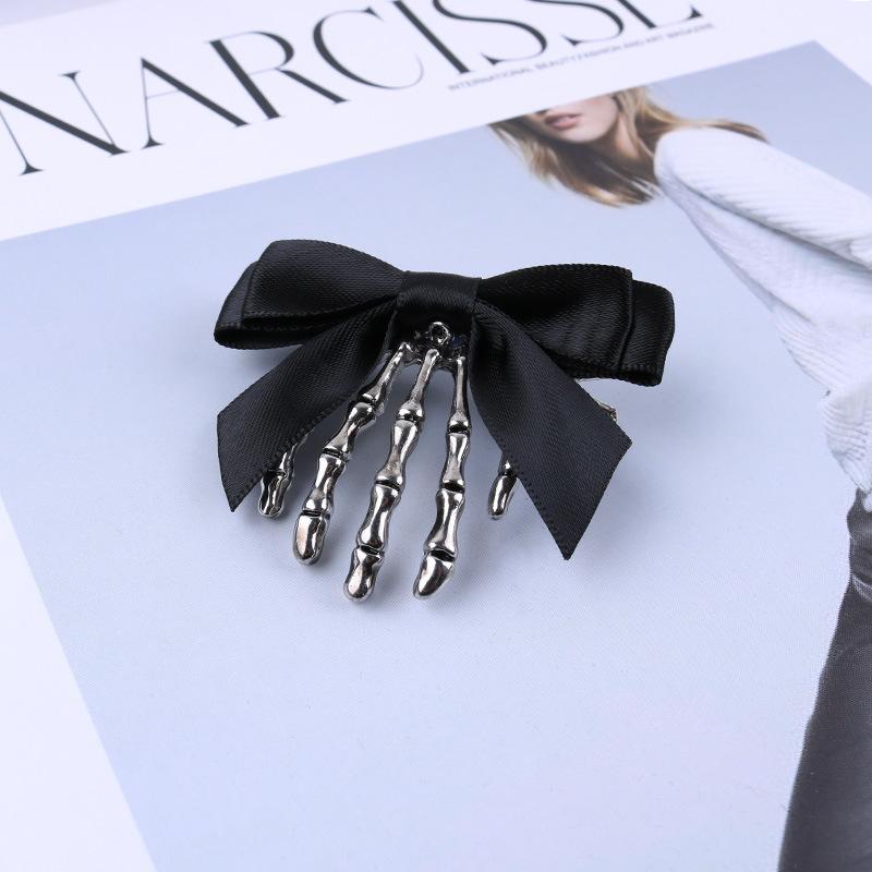 

European and American personalized bow skull ghost hand claw hair clip headwear retro duckbill clip back of the head