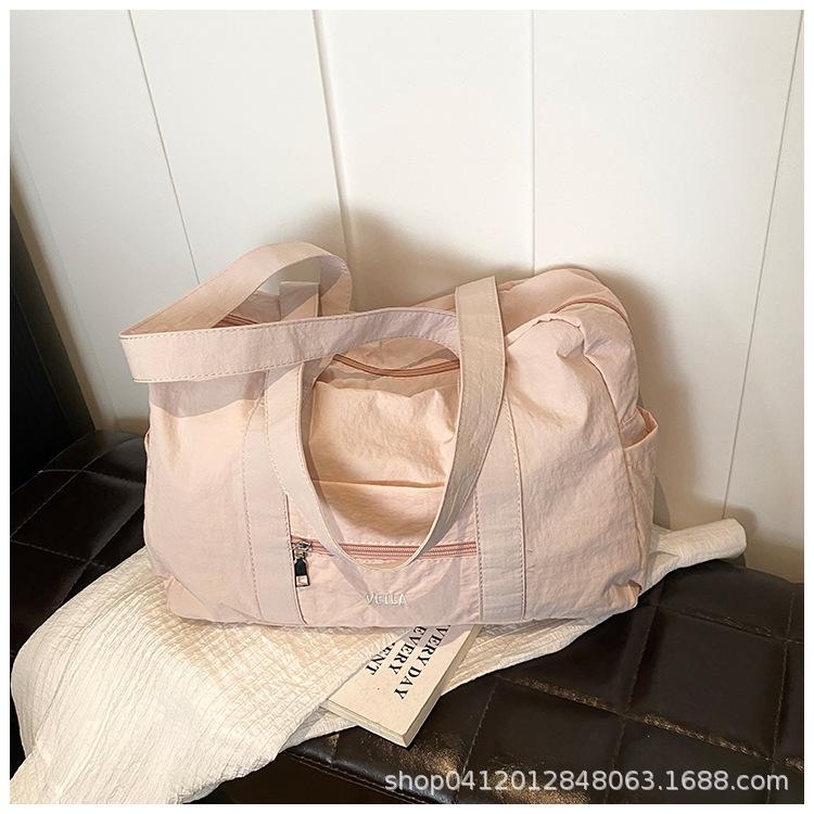 

Oxford cloth casual fitness bag large capacity fashion shoulder bag women s 2025 new business trip commuter bag розовый