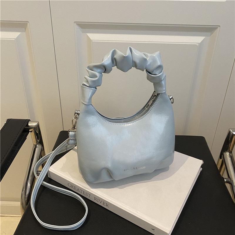 Silver handväska dam ny nischdesign moln messenger bag vår och sommar high-end känsla jobb liten väska