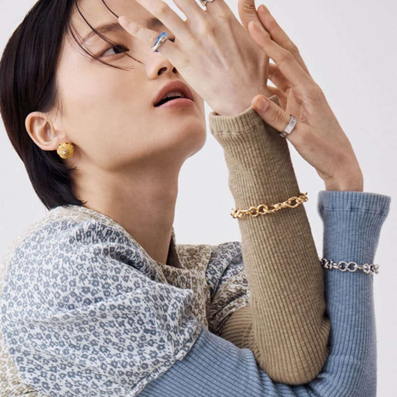 NEUF PIECE GATE SYMBOL BRACELET / SILVER