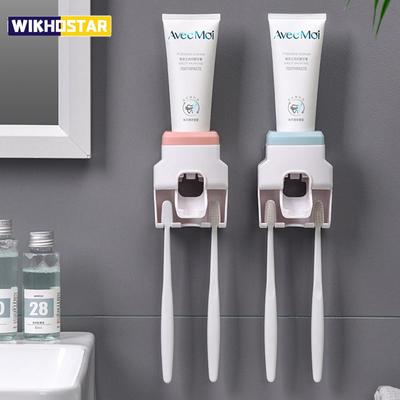 Dispenser automatico di dentifricio creativo per montaggio a parete Set di accessori per il bagno Set portaspazzolino spremi dentifricio pigro impermeabile