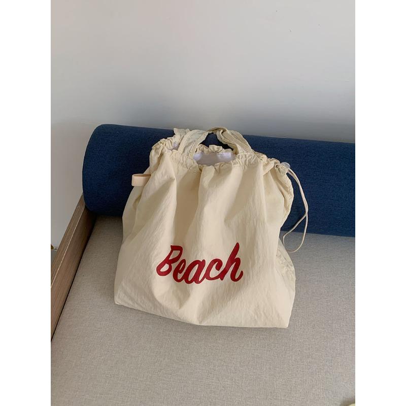 

Summer new drawstring nylon bag lazy wind tote bag women s commuter shoulder bag large capacity canvas bag tide