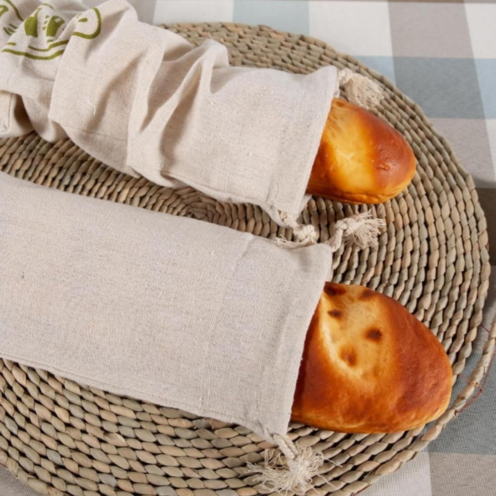 A reusable linen bread storage bag - an unbleached drawstring bag for the natural storage of homemade bread and pastries