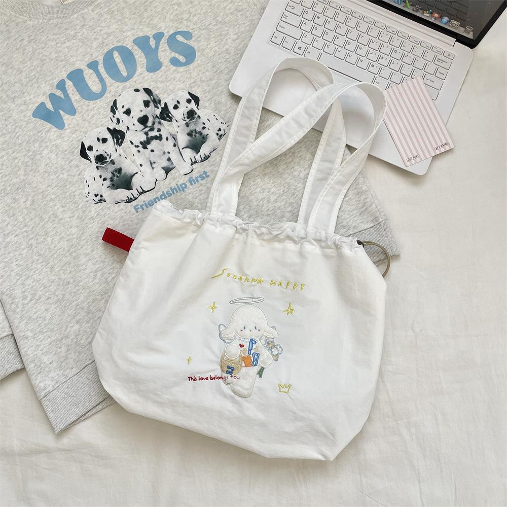 Canvas bag Large capacity women's embroidery lamb fabric bag Simple versatile drawstring bundle shoulder bag
