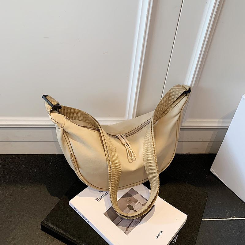 

Casual simple dumpling bag nylon canvas bag female messenger bag versatile breast bag lightweight underarm bag хаки